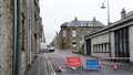 The approach road to Traill St, Manson's Lane, is cordoned off as well. Picture: DGS