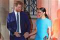 What is Harry’s concern with his UK security and why is he taking legal action?