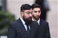 Brothers deny assaulting police at Manchester Airport