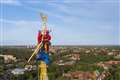 Father and son return weather vane to cathedral’s towering spire