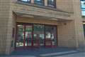 Former MP appears in court charged with harassing ex-wife
