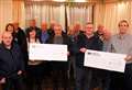 Ploughing ahead for good causes – £7000 charity cheques handed over by Caithness tractor club 