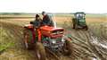 Don Macleod driving and Clair Meiklejohn standing on a Massey Ferguson tractor. Picture: DGS