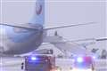 Third person dies and plane skids off runway as Storm Babet batters UK