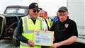 Bert Cooper, left, was given honorary membership of Caithness and Sutherland Vintage and Classic Vehicle Club by chair Kevin Sutherland. Picture: DGS