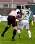 Buckie's Darryl McHardy tries to take possession of Owen Rendall's shirt. Picture: Mel Roger