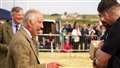 King Charles III congratulates Caithness Rugby Club which won the tug of war. Picture: DGS