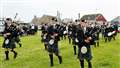 Wick RBLS Pipe Band take to the field. Picture: DGS