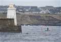 PICTURES: Charlie Heads into Wick after gruelling 24-hour paddleboard journey through the night