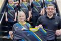 Amentum presents squad T-shirts to Caithness Junior Badminton Club