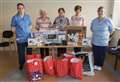 Friends of Caithness General hand over Christmas gifts to Wick hospital