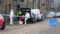 Police attending the scene at Wick's Barrogill Street on Sunday. Picture: DGS