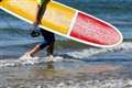 Surfers brave the chill to ride the waves at Thurso East