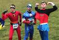 Superheroes complete night race for charity