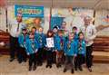 Thurso Beaver Scout earns top award signed by Bear Grylls