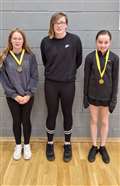 U13 girls' doubles consolation winners Kenzie Sinclair and Sophie Sinclair with Chloe Mackenzie.