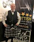 Brian Travers, owner of Jimmy's Taxis, at the ceremony in Glasgow on Saturday night.