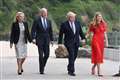 Jill Biden and Carrie Johnson join their husbands for stroll ahead of G7