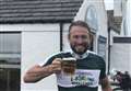 Scottish-born adventurer Jamie Ramsay takes time for a beer at John O'Groats