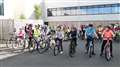 Junior triathlon competitors ready to set off on the cycle section of the event.