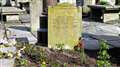 This gravestone was completely covered until shrubs were cut back to reveal it. Pictures: DGS