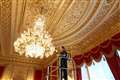 Grand chandelier and candelabra prepped for opening of Windsor semi-state rooms