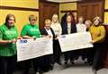 Wick Eastern Star members hand over charity cheques