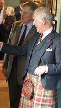 His Royal Highness surveys some of the many fine artworks on display at the Granary Lodge.