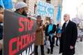 Sir Iain Duncan Smith joins protest by Uighur activists at FCDO