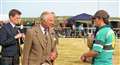 King Charles III congratulates Caithness Rugby Club which won the tug of war. Picture: DGS