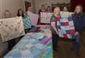 Donation of quilts from Caithness SWI is all sewn up