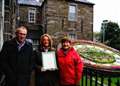 Floral clock chimes with awards judges