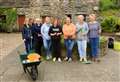 Paths group and flower baskets volunteers in Wick memorial garden tidy-up 