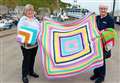 Carol goes up a size with blankets for Fishermen's Mission at Scrabster