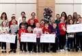 PICTURES: Charity cheques handed over by caring Newton Park pupils