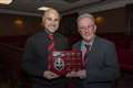 Wick Groats' top scorer Sandy Sutherland receives his trophy from long-time supporter and club stalwart Jocky Shearer.
