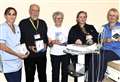 Caithness Heart Support Group donates ECG unit to Three Harbour GP practice