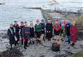 Swimmers enjoy invigorating Christmas Day dip at Ackergill