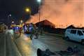 Major incident declared as 100 firefighters tackle blaze in derelict factories