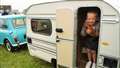 Young Mikey who was visiting the rally stands in a tiny caravan. Picture: DGS