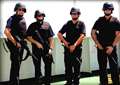 Ronnie has worked with specialist security services in many conflict zones. He is pictured (left) while his colleagues' faces have been disguised to protect their identities.