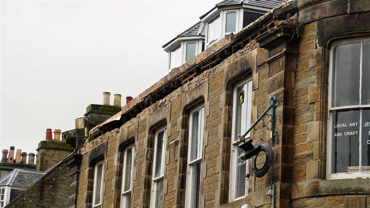 The roof parapet showing where the huge sandstone blocks fell from. Professional artist and jewellery maker Lindsey Gallacher has a studio and shop directly under it. Picture: DGS