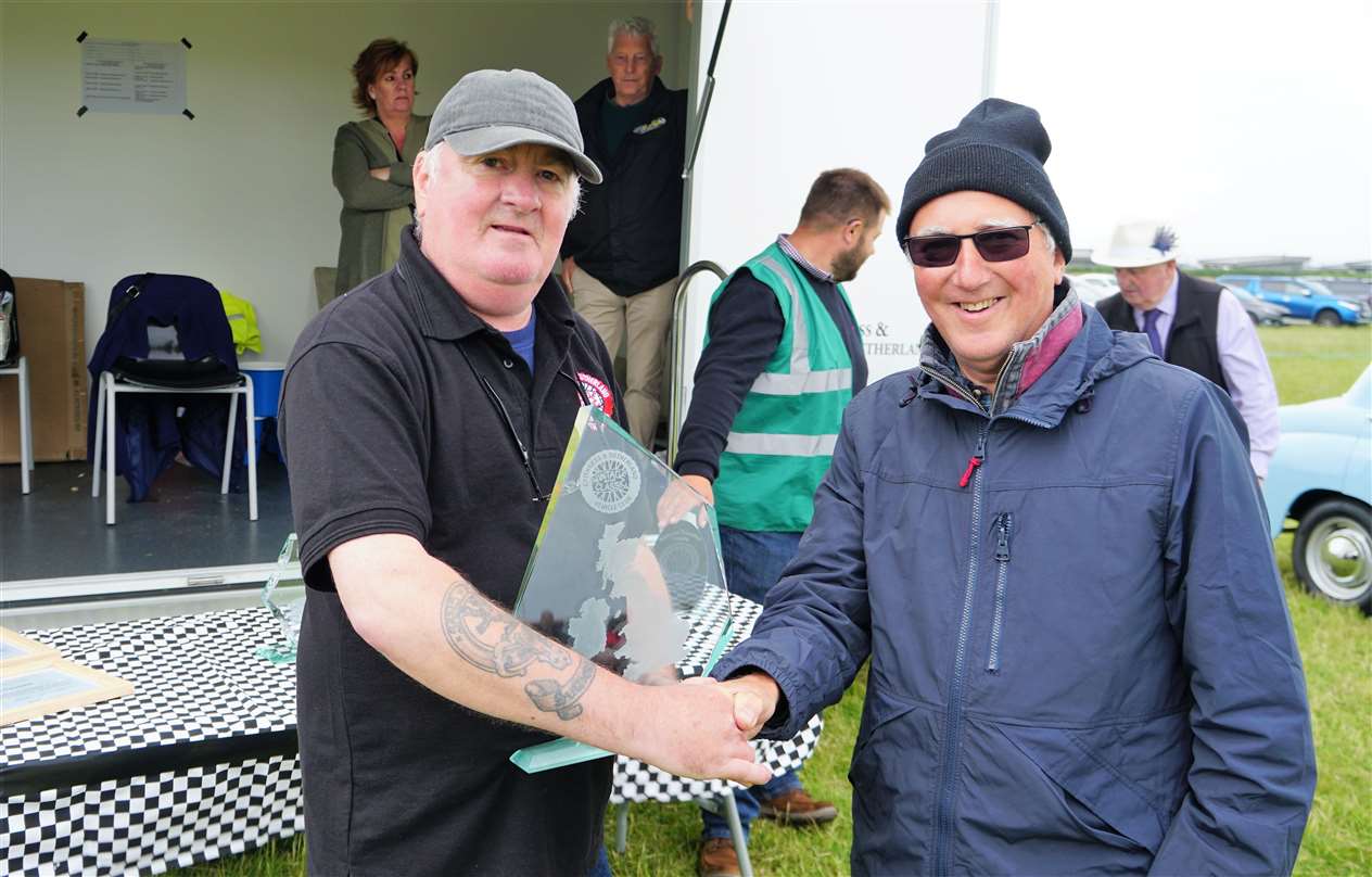 Furthest travelled vehicle driven to the show was a 1960 Austin Healey Frog-eyed Sprite owned by Duncan Mitchell from Pitlochry, at right, covering 203 miles to be at the show field. Picture: DGS