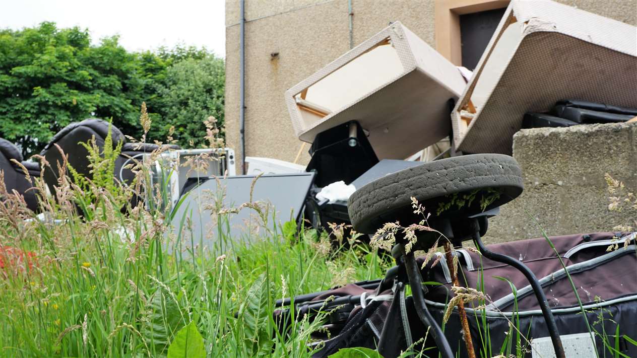 These properties at Kennedy Terrace in Wick have become a dumping ground for fly-tippers. Pictures: DGS