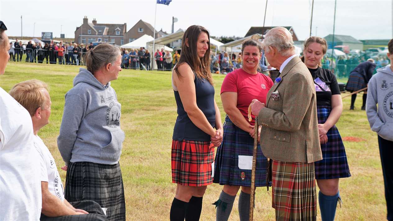 King Charles III congratulates Zuzana Spasova and some of the other female athletes at the event. Picture: DGS
