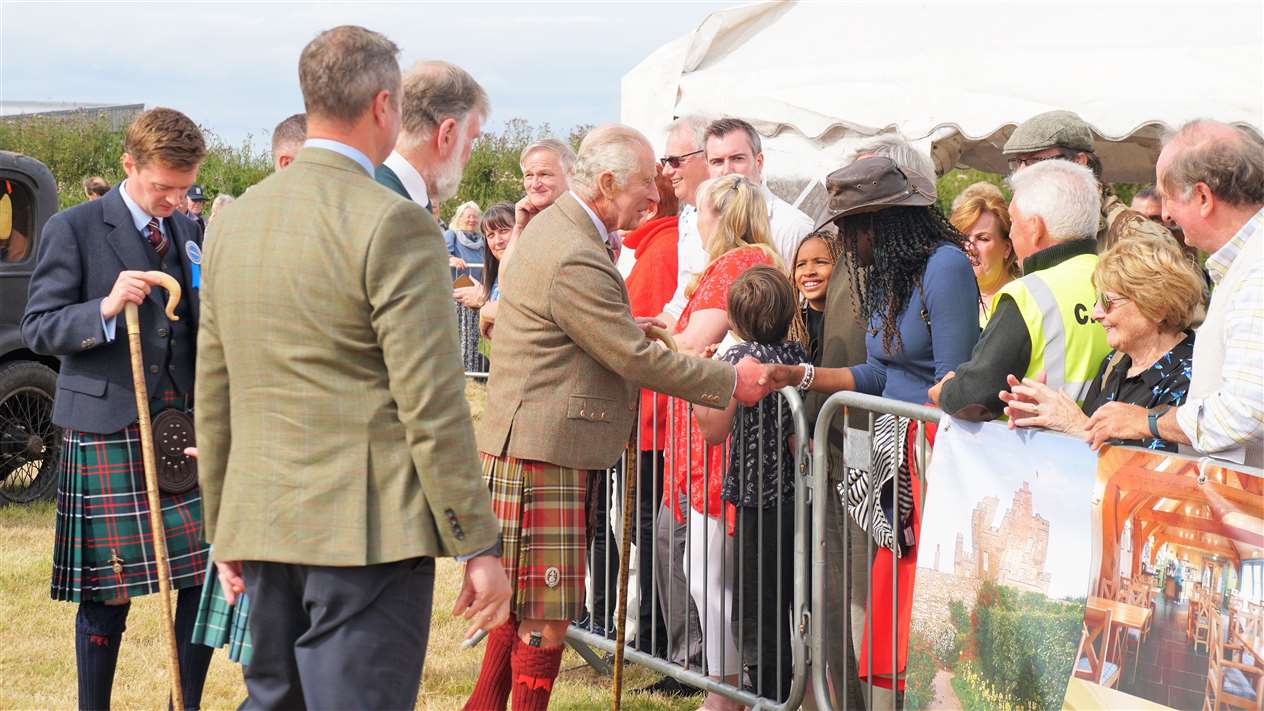 The King met some of the visitors to the event but curtailed his walkabout through the trade stands. Picture: DGS