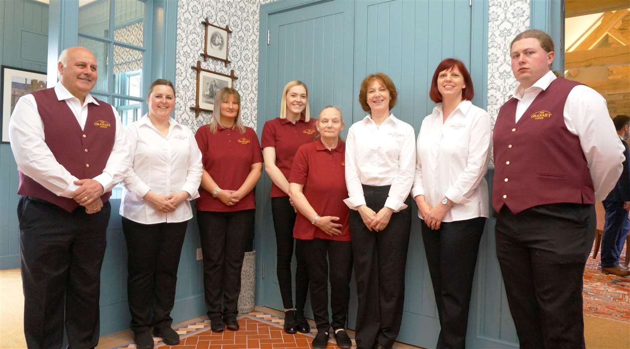 The staff stand resplendent in their new uniforms. The Castle of Mey Trust prides itself on employing local folk.