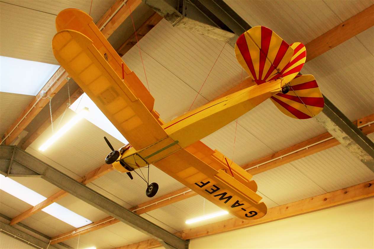 A model aircraft hanging from the ceiling.