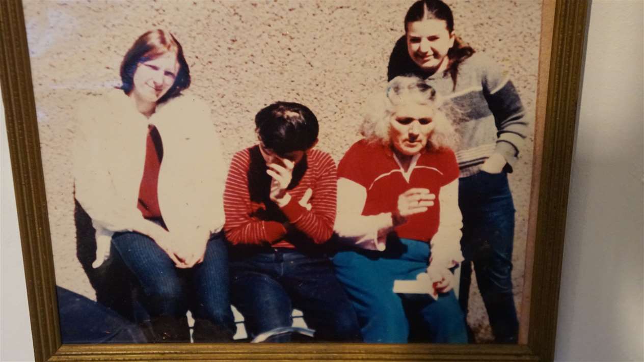 Charlie McPhee's family pictures on the wall of his house. Picture: DGS