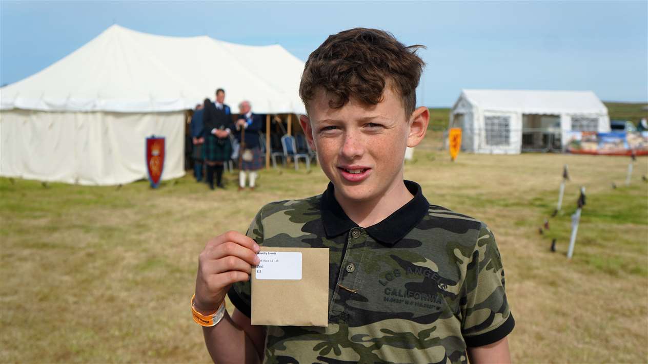 Elliot Thompson from Barcelona won a prize in the sack race. Picture: DGS